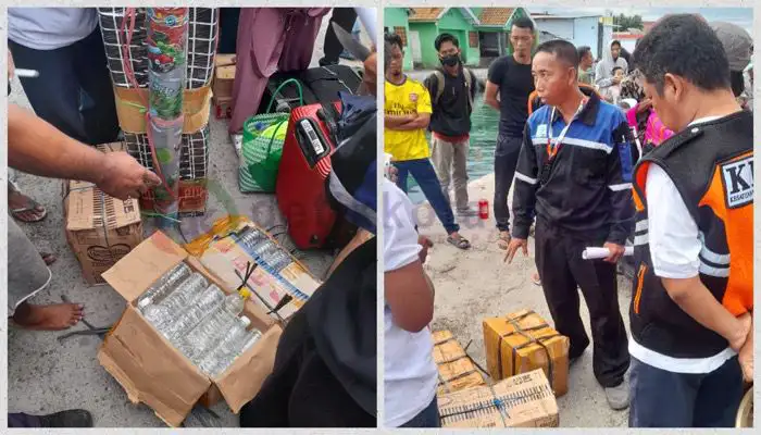 Petugas memeriksa tiga karton arak Bali yang dibawa penumpang Kapal Perintis KM Sabuk Nusantara51 di Pelabuhan Sapeken.
