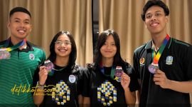 Farrel Nandana Putra dan Zerllina Putri Najwa asal Kabupaten Pasuruan usai meraih medali perak di Kejuaraan Finswimming Asia 2025 di China.