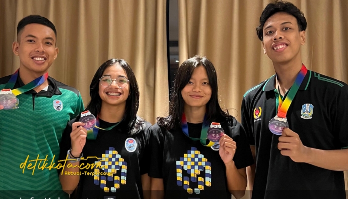 Farrel Nandana Putra dan Zerllina Putri Najwa asal Kabupaten Pasuruan usai meraih medali perak di Kejuaraan Finswimming Asia 2025 di China.