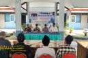 Kepala Dinas PRKP Bangkalan, Moh. Hasan Faisol, memberikan sambutan pada kegiatan sosialisasi PBG dan SLF di Kecamatan Tanah Merah, Kamis (9/10/2025).