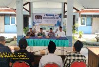 Kepala Dinas PRKP Bangkalan, Moh. Hasan Faisol, memberikan sambutan pada kegiatan sosialisasi PBG dan SLF di Kecamatan Tanah Merah, Kamis (9/10/2025).