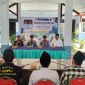 Kepala Dinas PRKP Bangkalan, Moh. Hasan Faisol, memberikan sambutan pada kegiatan sosialisasi PBG dan SLF di Kecamatan Tanah Merah, Kamis (9/10/2025).