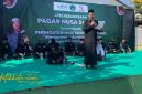 Ketua PC PSNU Pagar Nusa Sumenep KH Abdul Muiz memimpin Gelar Pasukan Siaga Bela Kiai dan Latihan Gabungan di Ponpes Mathaliul Anwar Pangarangan, Ahad (19/10/2025).