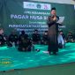 Ketua PC PSNU Pagar Nusa Sumenep KH Abdul Muiz memimpin Gelar Pasukan Siaga Bela Kiai dan Latihan Gabungan di Ponpes Mathaliul Anwar Pangarangan, Ahad (19/10/2025).
