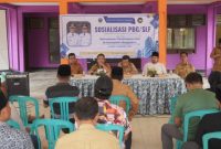 Kepala Dinas PRKP Bangkalan Moh. Hasan Faisol saat memberikan sosialisasi Persetujuan Bangunan Gedung (PBG) dan Sertifikat Laik Fungsi (SLF) di Kecamatan Klampis, Selasa (11/10/2025).