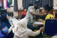 Pelaksanaan pelatihan fisioterapi bagi guru SLB dan orang tua ABK di Banyuwangi yang digelar Perkins International.