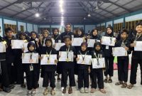 Atlet pencak silat PSHT Cabang Sumenep usai meraih puluhan medali pada Kejuaraan Pencak Silat UIM CUP III 2025 dan Malang Student Championship 2025.