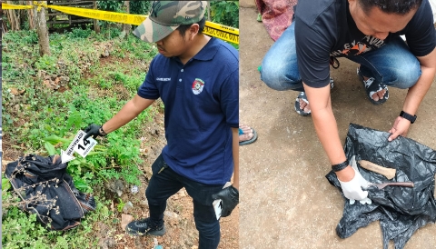 Petugas kepolisian melakukan olah TKP dugaan pembunuhan di Desa Lenteng Barat, Kecamatan Lenteng, Kabupaten Sumenep.