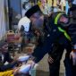 Personel Satlantas Polres Sumenep membagikan santap sahur kepada warga saat kegiatan Polantas Menyapa Sahur Off The Road di wilayah Kota Sumenep.