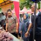 Pasar Murah Ramadan yang digelar Pemkab Bangkalan di depan Pendopo Agung Bangkalan untuk membeli kebutuhan pokok dengan harga terjangkau.