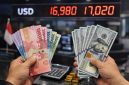 uang rupiah dan dolar AS.