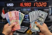 uang rupiah dan dolar AS.