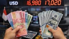 uang rupiah dan dolar AS.