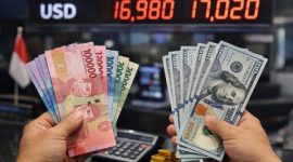 uang rupiah dan dolar AS.