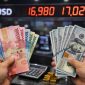 uang rupiah dan dolar AS.