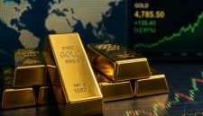 Ilustrasi emas batangan yang mencerminkan fluktuasi harga di pasar global.