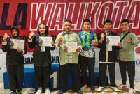 Foto bersama para atlet usai berlaga di Kejurnas Wushu Piala Wali Kota Surabaya, 1–3 Mei 2026.