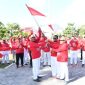 Bupati Sumenep Achmad Fauzi Wongsojudo secara simbolis menyerahkan Bendera Merah Putih kepada Aparatur Sipil Negara (ASN) di lingkungan Pemerintah Kabupaten Sumenep, Senin (3/8/2026).