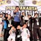 Atlet Perisai Diri Purnawarman Club berfoto bersama usai mengikuti Purwakarta Sribaduga Championship 2026. Sebanyak 12 atlet yang diturunkan berhasil meraih 5 medali emas dan 7 medali perak.