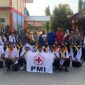 Anggota PMR WIRA Unit SMKN 1 Kalianget bersama civitas akademika usai mengikuti rangkaian peringatan HUT PMI ke-81 di lingkungan sekolah.